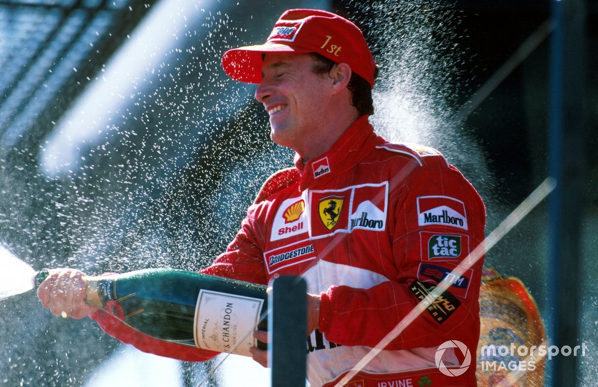Irvine scored his first win for Ferrari on a day that both McLarens broke down