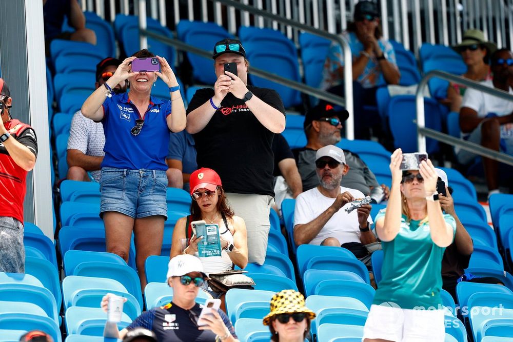 Fans watch the drivers parade