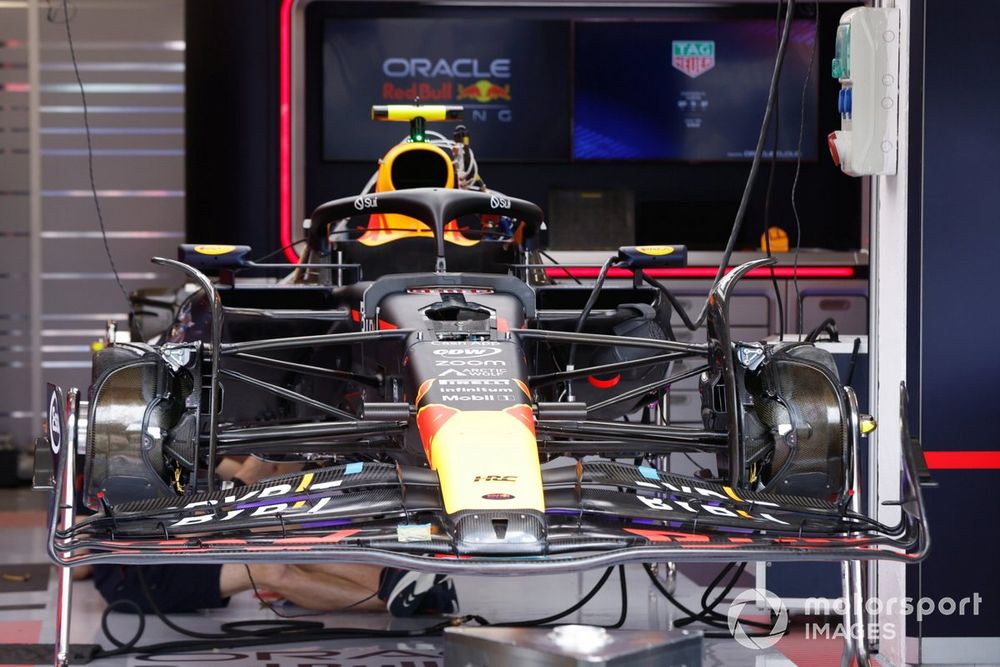 Mechanics work on a Red Bull Racing RB19