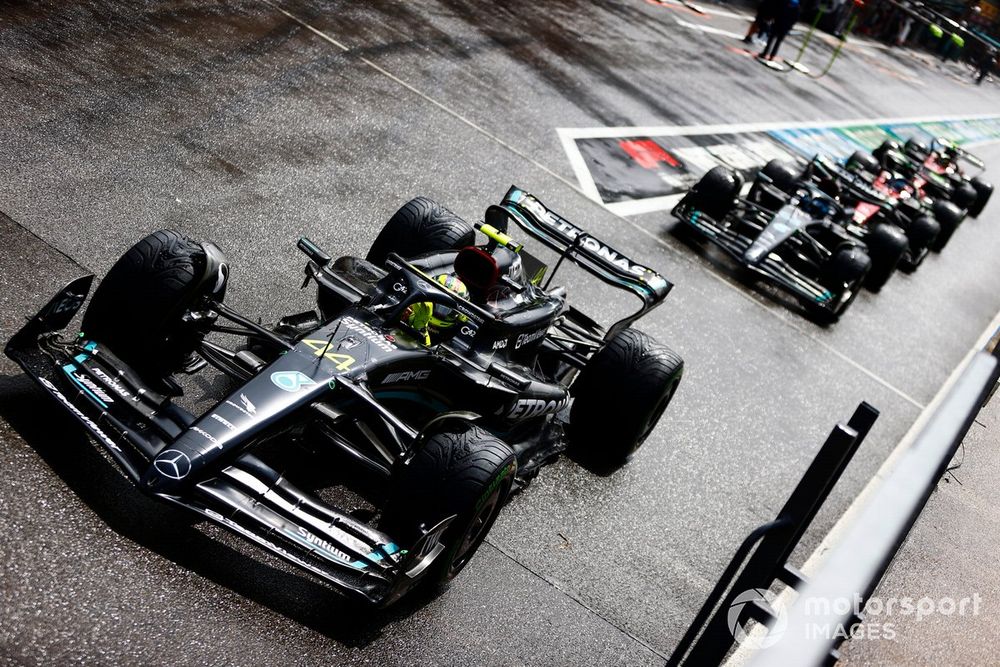Lewis Hamilton, Mercedes F1 W14, George Russell, Mercedes F1 W14, Valtteri Bottas, Alfa Romeo C43, out of the pits