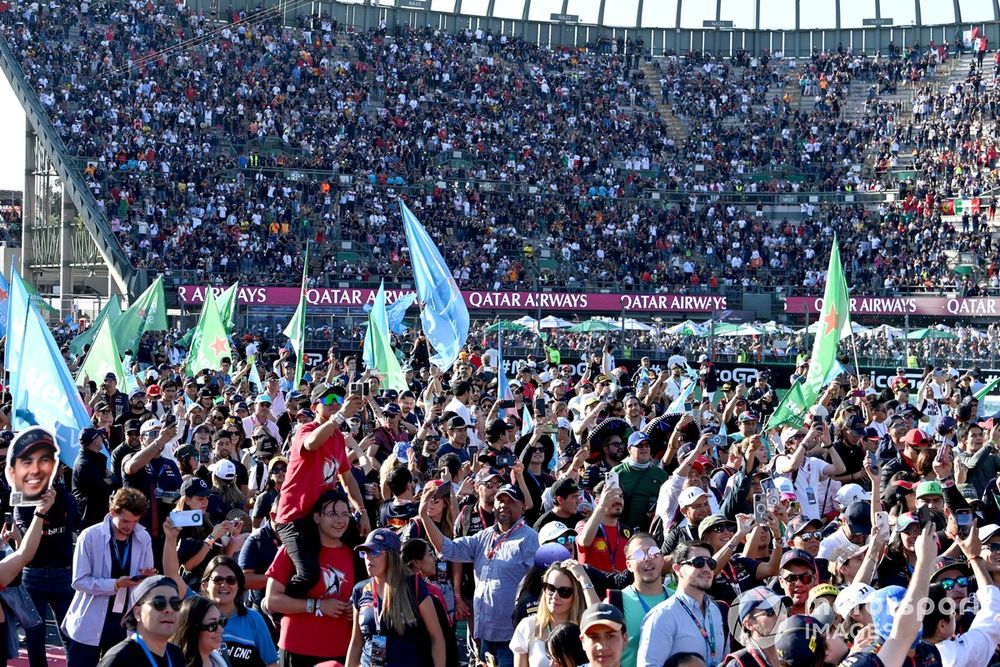 Fans invade the ciruit after the race
