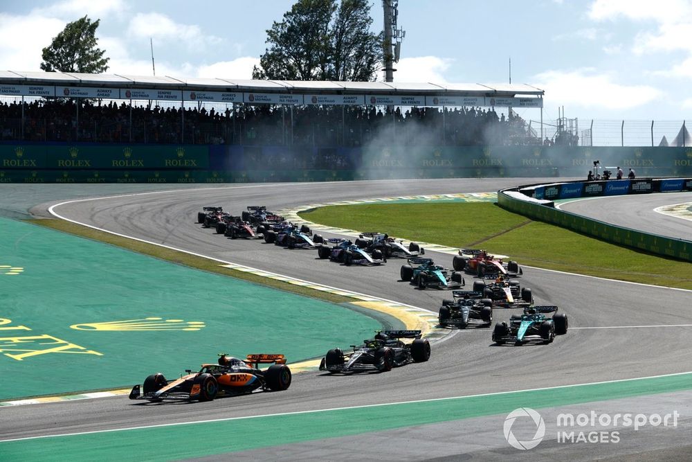 Lando Norris, McLaren MCL60, Lewis Hamilton, Mercedes F1 W14, Fernando Alonso, Aston Martin AMR23, George Russell, Mercedes F1 W14, the remainder of the field for the restart