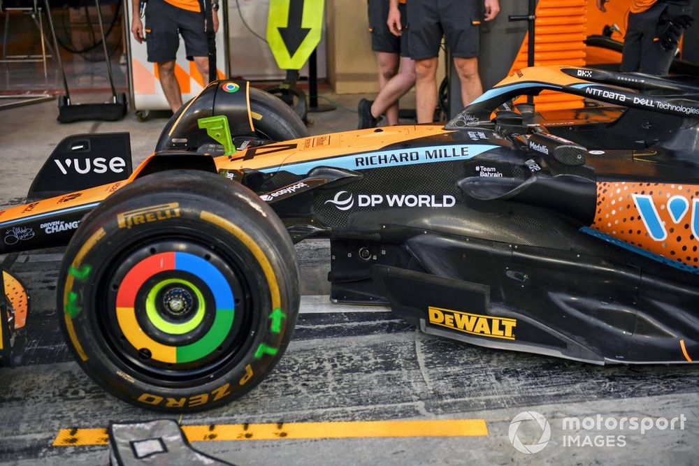 The McLaren MCL60 in the pit lane 