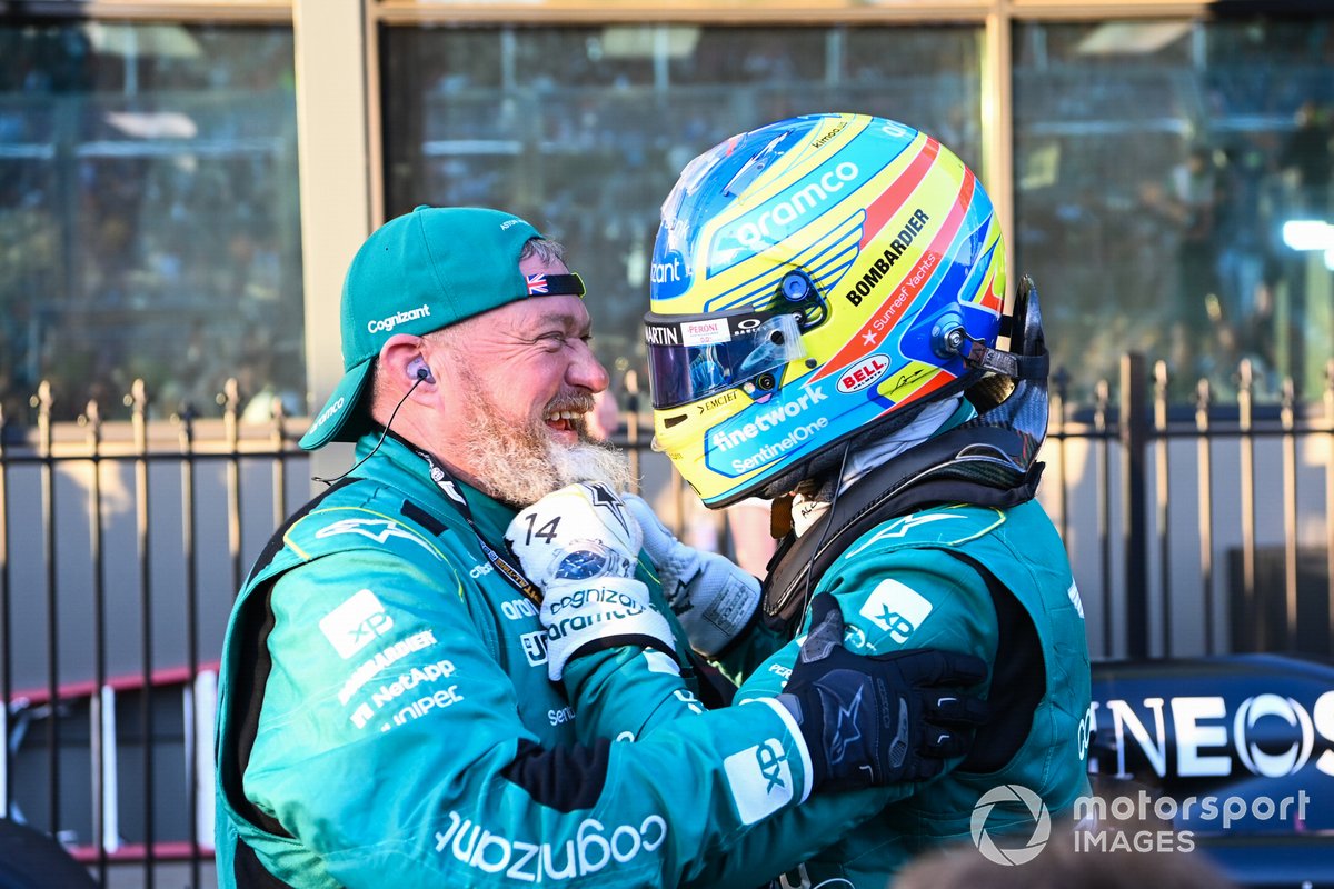 Fernando Alonso, Aston Martin F1 Team, 3rd position, celebrates in Parc Ferme with a team mate