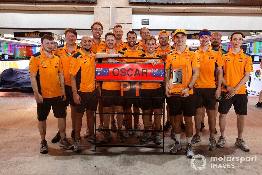 Oscar Piastri, McLaren, first position, celebrates with his team after winning the sprint race