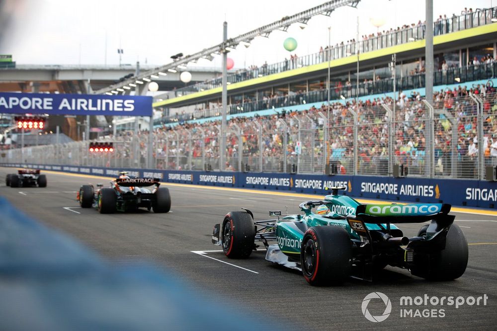 Lando Norris, McLaren MCL60, Fernando Alonso, Aston Martin AMR23, practice their race start procedures at the end of FP3