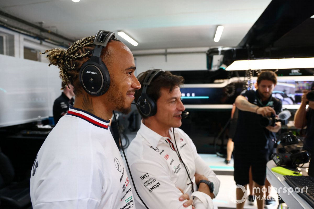 Lewis Hamilton, Mercedes-AMG, watches on with Toto Wolff, Team Principal and CEO, Mercedes AMG 