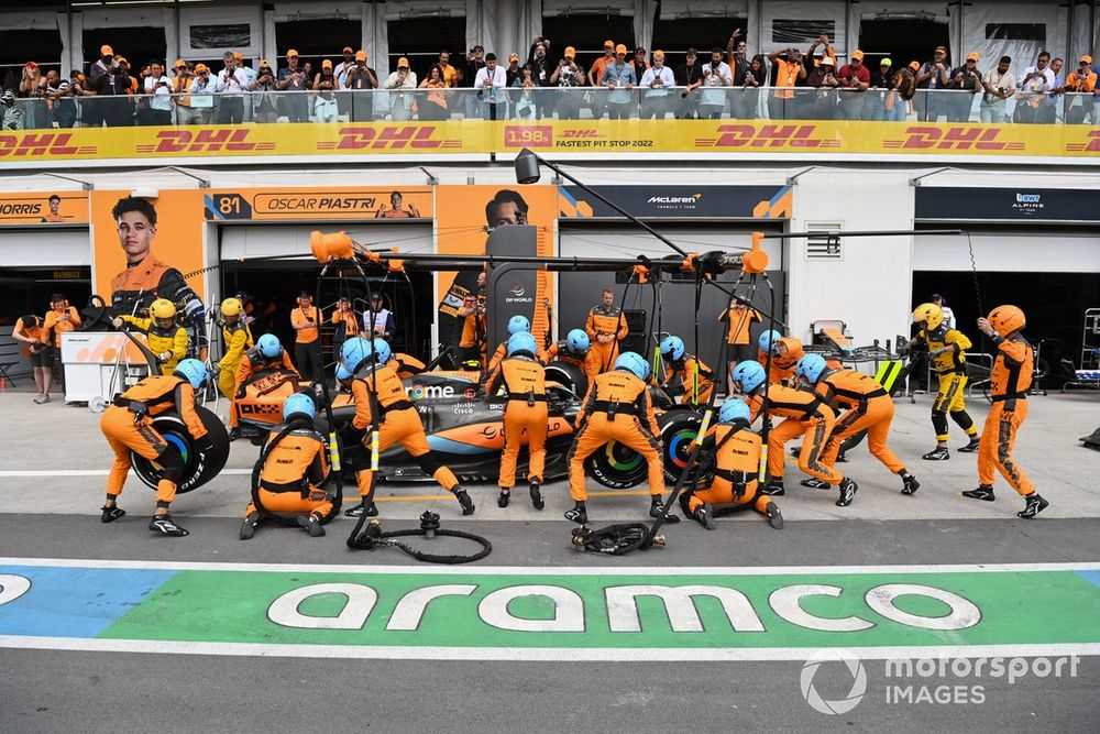 Lando Norris, McLaren MCL60, in the pits