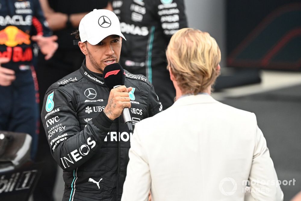 Lewis Hamilton, Mercedes-AMG, 2nd position, is interviewed by Nico Rosberg after the race