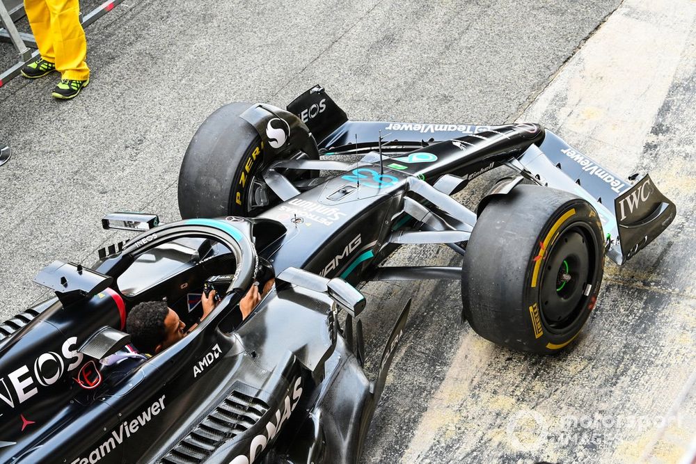 The AMG Mercedes team conduct pit stop practise on the Mercedes F1 W14 of George Russell