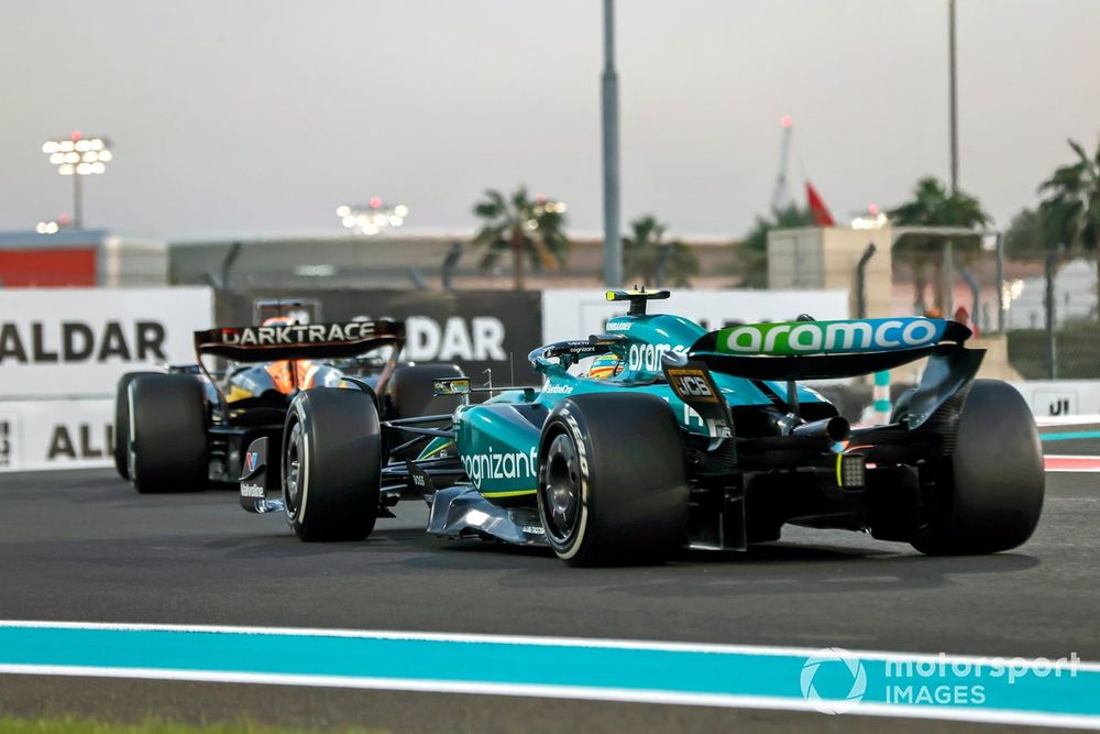 Oscar Piastri, McLaren MCL60, leads Fernando Alonso, Aston Martin AMR23