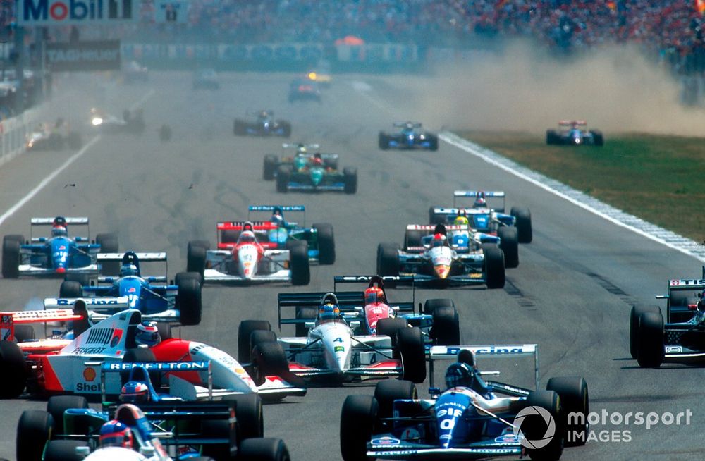 Hakkinen (whose McLaren is spinning here) was banned for his part in this Hockenheim pile-up