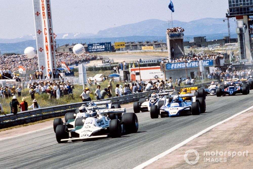 Carlos Reutemann, Williams FW07B Ford, leads Alan Jones, Williams FW07B Ford, Didier Pironi, Ligier JS11/15 Ford, and Nelson Piquet, Brabham BT49 Ford
