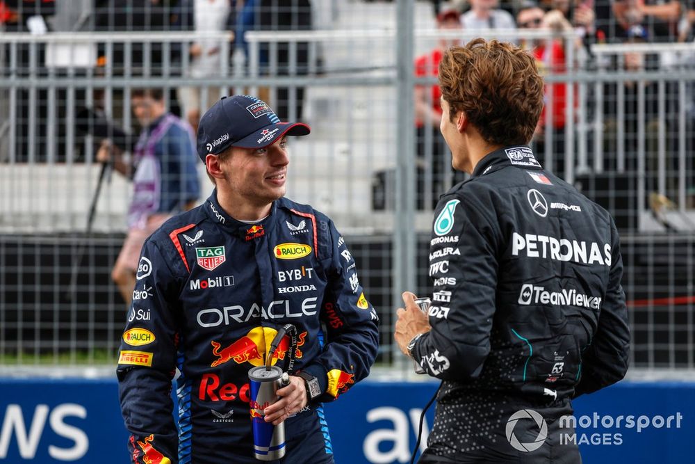 Pole man George Russell, Mercedes-AMG F1 Team, with Max Verstappen, Red Bull Racing, in Parc Ferme 