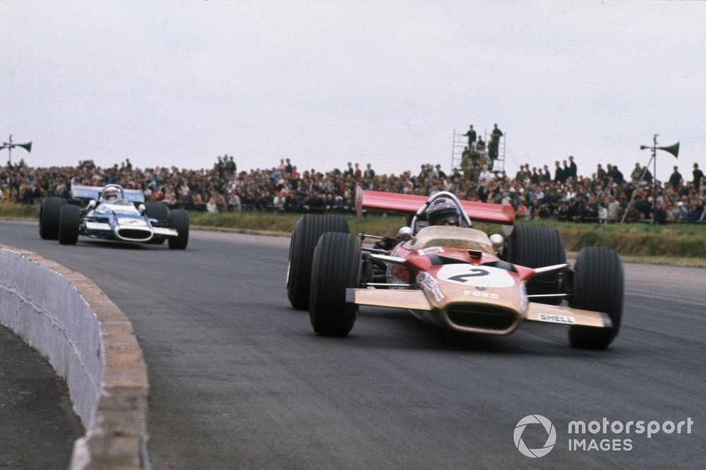 Jochen Rindt, Lotus 49B Ford, leads Jackie Stewart, Matra MS80 Ford