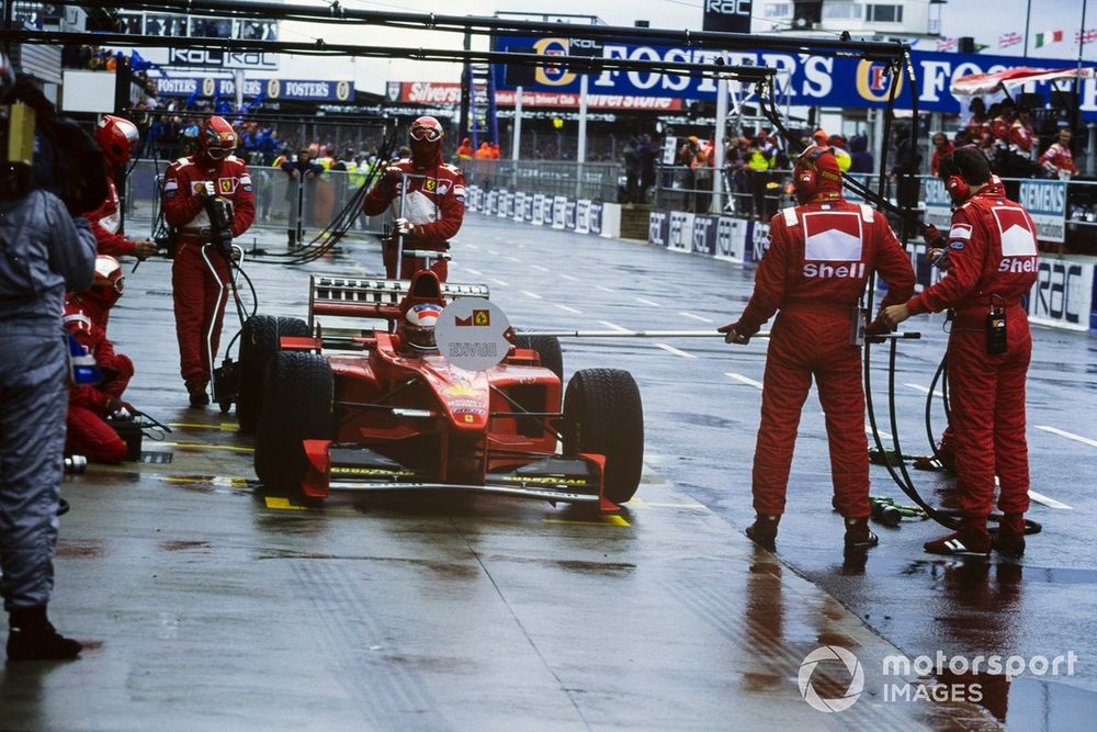 Michael Schumacher, Ferrari F300 makes his stop and go penalty