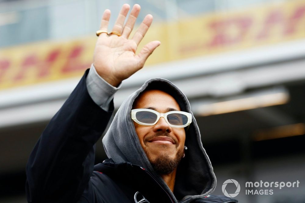 Lewis Hamilton, Mercedes-AMG F1 Team, waves at the crowds ahead of the drivers parade 