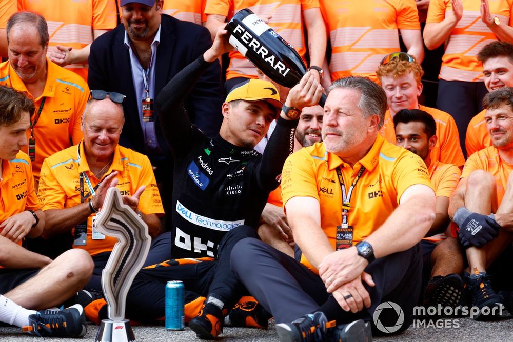 Lando Norris, McLaren F1 Team, 2nd position, pours Champagne over Zak Brown, CEO, McLaren Racing, at the McLaren celebration gathering