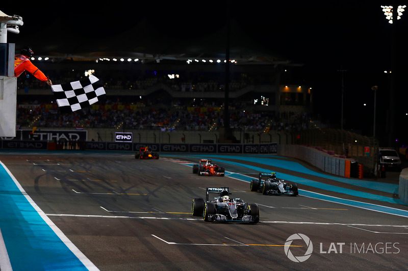 Lewis Hamilton, Mercedes F1 W07 Hybrid, crosses the line and takes the chequered flag to win the race from Nico Rosberg, Mercedes F1 W07 Hybrid, Sebastian Vettel, Ferrari SF16-H, and Max Verstappen, Red Bull Racing RB12