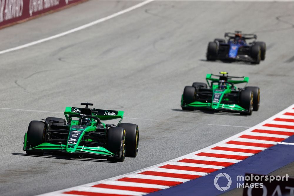 Valtteri Bottas, Stake F1 Team Kick Sauber C44, leads Zhou Guanyu, Stake F1 Team Kick Sauber C44, and Alex Albon, Williams FW46