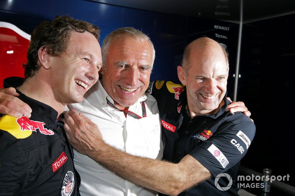 Yas Marina Circuit, Abu Dhabi, United Arab Emirates14th November 2010.Adrian Newey, Chief Technical Officer, Red Bull Racing, and Christian Horner, Team Principal, Red Bull Racing, and Dietrich Mateschitz, CEO Red Bull, celebrate victory. Portrait. World Charles Coates/LAT Photographic ref: Digital Image DX5J5597