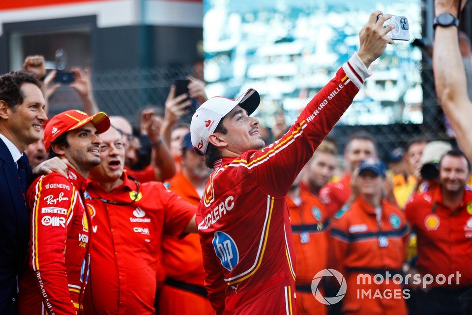 Charles Leclerc, Scuderia Ferrari, 1st position, takes a photo with John Elkann, Carlos Sainz, Scuderia Ferrari, 3rd position, Frederic Vasseur, Team Principal and General Manager, Scuderia Ferrari, in Parc Ferme