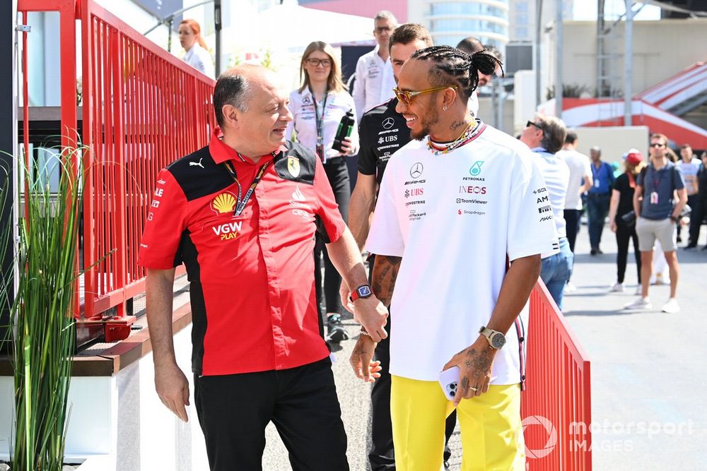 Frederic Vasseur, Team Principal and General Manager, Scuderia Ferrari, with Lewis Hamilton, Mercedes-AMG 