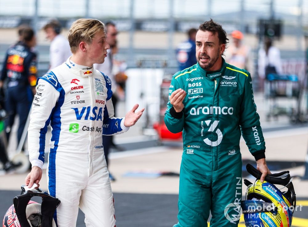 Liam Lawson, Visa Cash App RB F1 Team, and Fernando Alonso, Aston Martin F1 Team