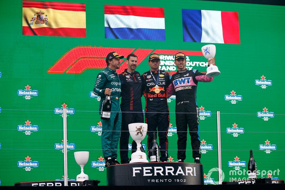 Fernando Alonso, Aston Martin F1 Team, 2nd position, the Red Bull trophy delegate, Max Verstappen, Red Bull Racing, 1st position, Pierre Gasly, Alpine F1 Team, 3rd position, on the podium