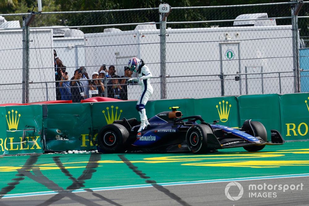 Logan Sargeant, Williams FW46, gets out of the car after crashing out of the race
