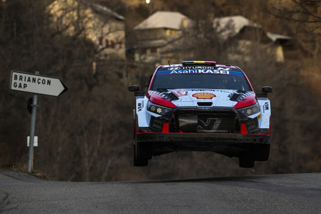 Neuville leapfrogs Evans and Ogier to lead
